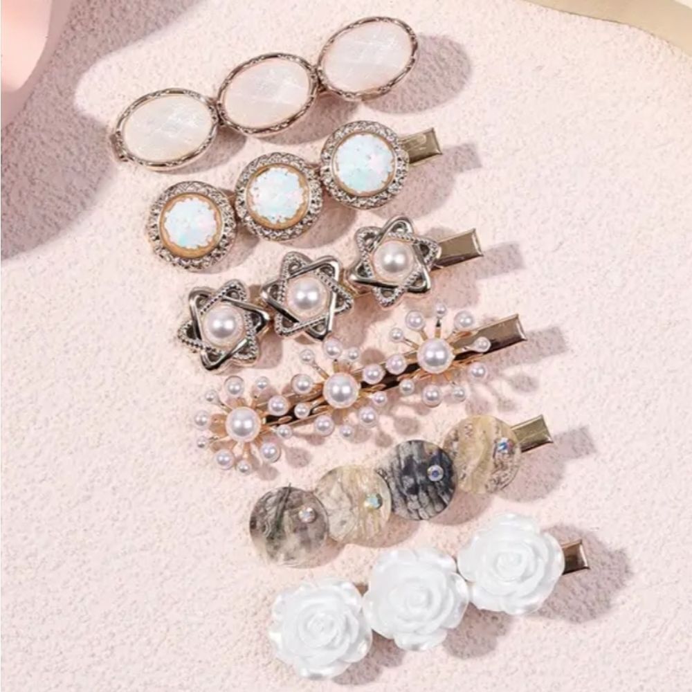 6 piece goldtone pearl shell clip set